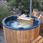photo 2 round hot tub with an Inside aluminium stove 25kw